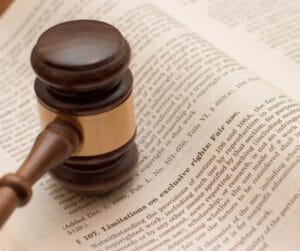 A book page with words about fair use with a gavel