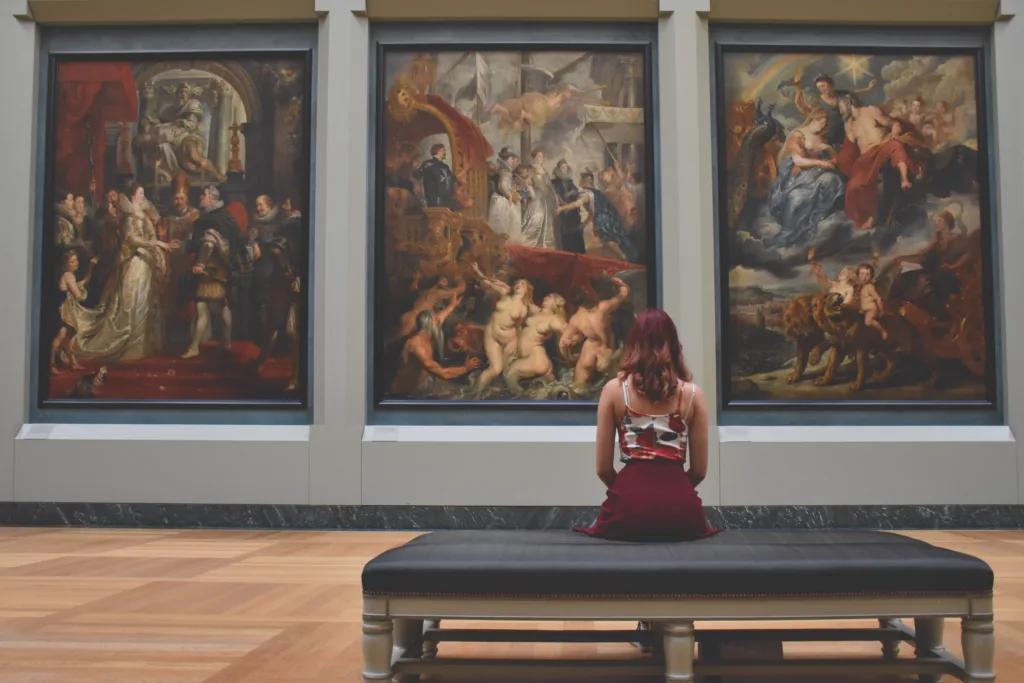 A girl seeking inspiration at an art gallery