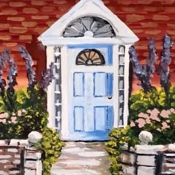 a red brick house with white trim